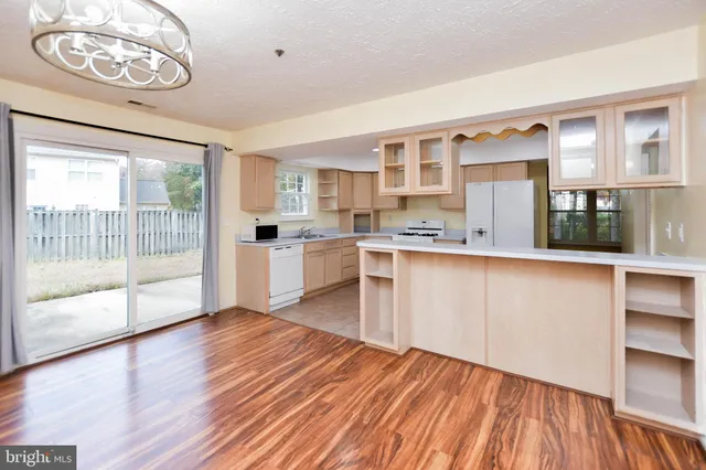 a view of a bathroom from a hallway
