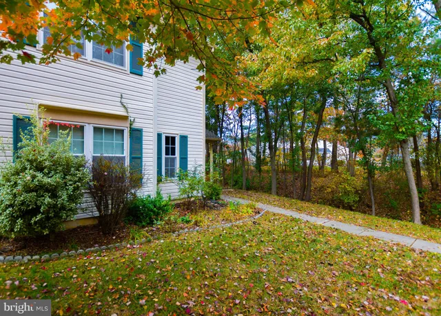 a view of a room wooden floor and a fireplace