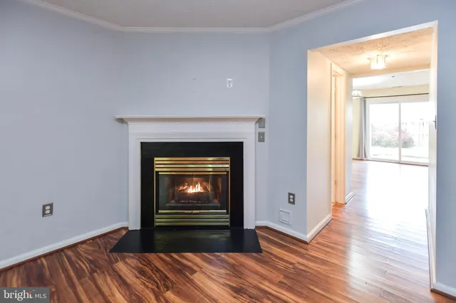 a kitchen with white cabinets a sink and dishwasher