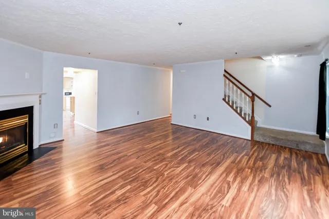 a kitchen with a stove a sink and a refrigerator