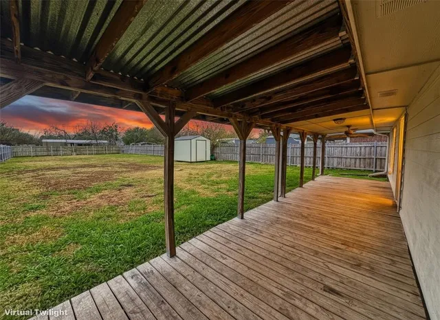 a view of a backyard of the house