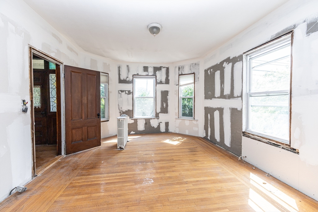 29 Gorham Street Chelmsford, MA 01824 - Photo 19 of 42 a view of a bedroom with furniture and window