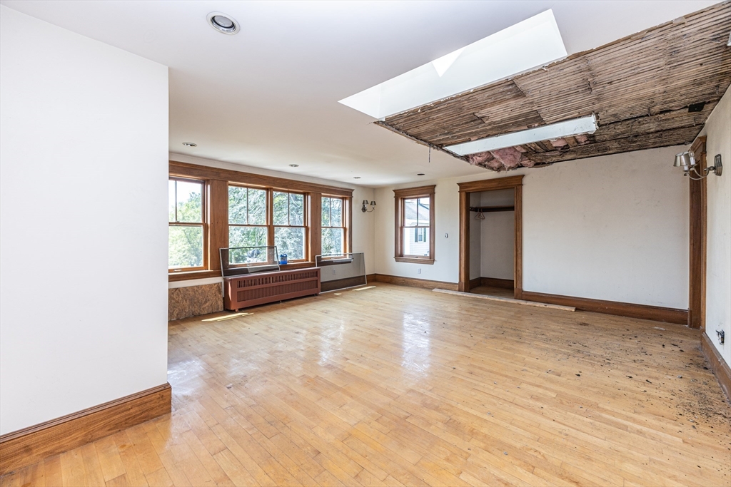 29 Gorham Street Chelmsford, MA 01824 - Photo 30 of 42 an empty room with windows
