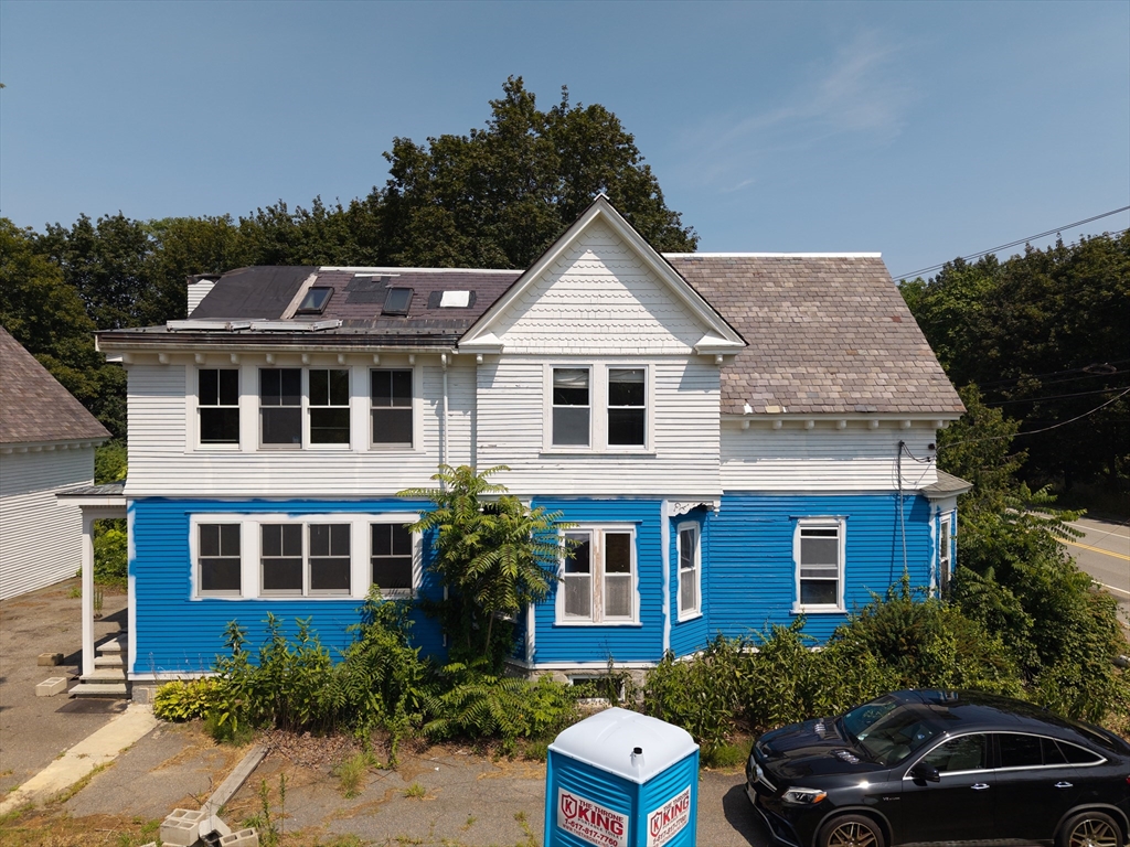 29 Gorham Street Chelmsford, MA 01824 - Photo 5 of 42 a front view of a house with yard and green space