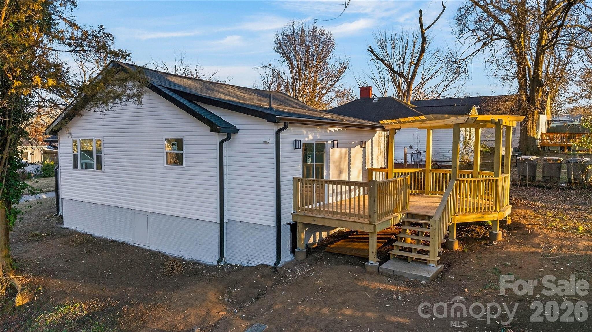 817 Mable Avenue Kannapolis, NC 28083 - Photo 16 of 20 a view of a house with backyard and sitting area