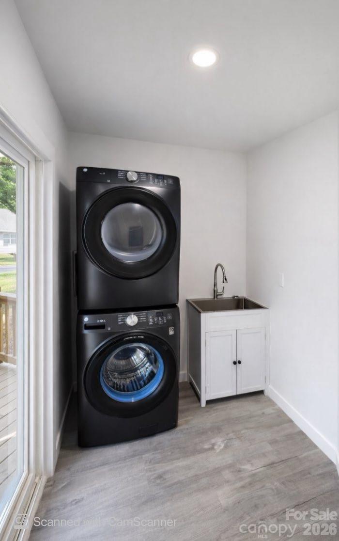 817 Mable Avenue Kannapolis, NC 28083 - Photo 8 of 20 a room with a washing machine and a sink