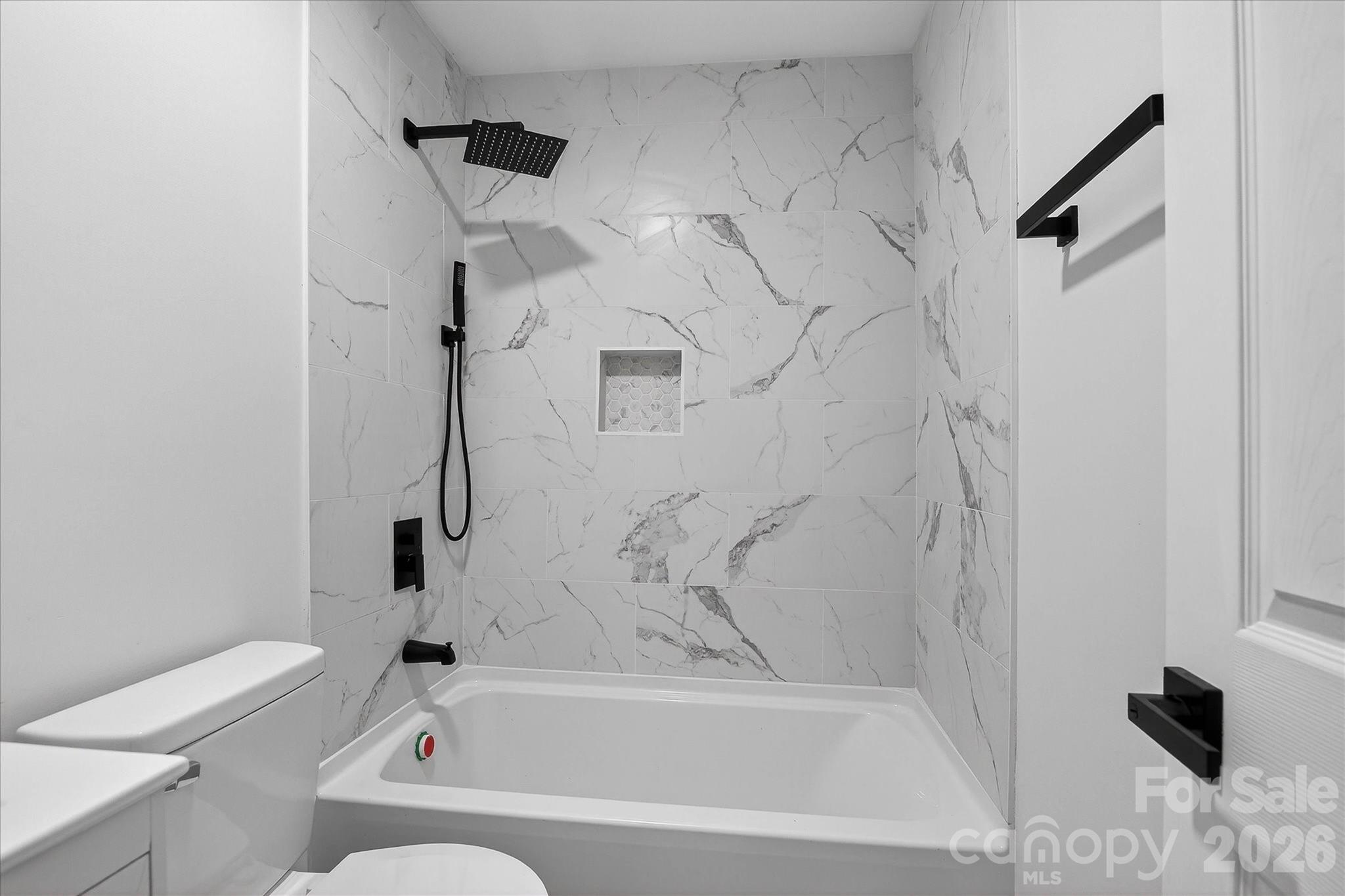 817 Mable Avenue Kannapolis, NC 28083 - Photo 10 of 20 a bathroom with a bathtub and a shower