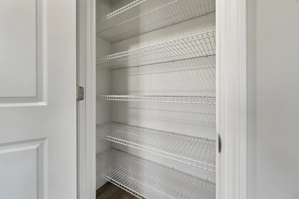 a view of a bathroom from a hallway