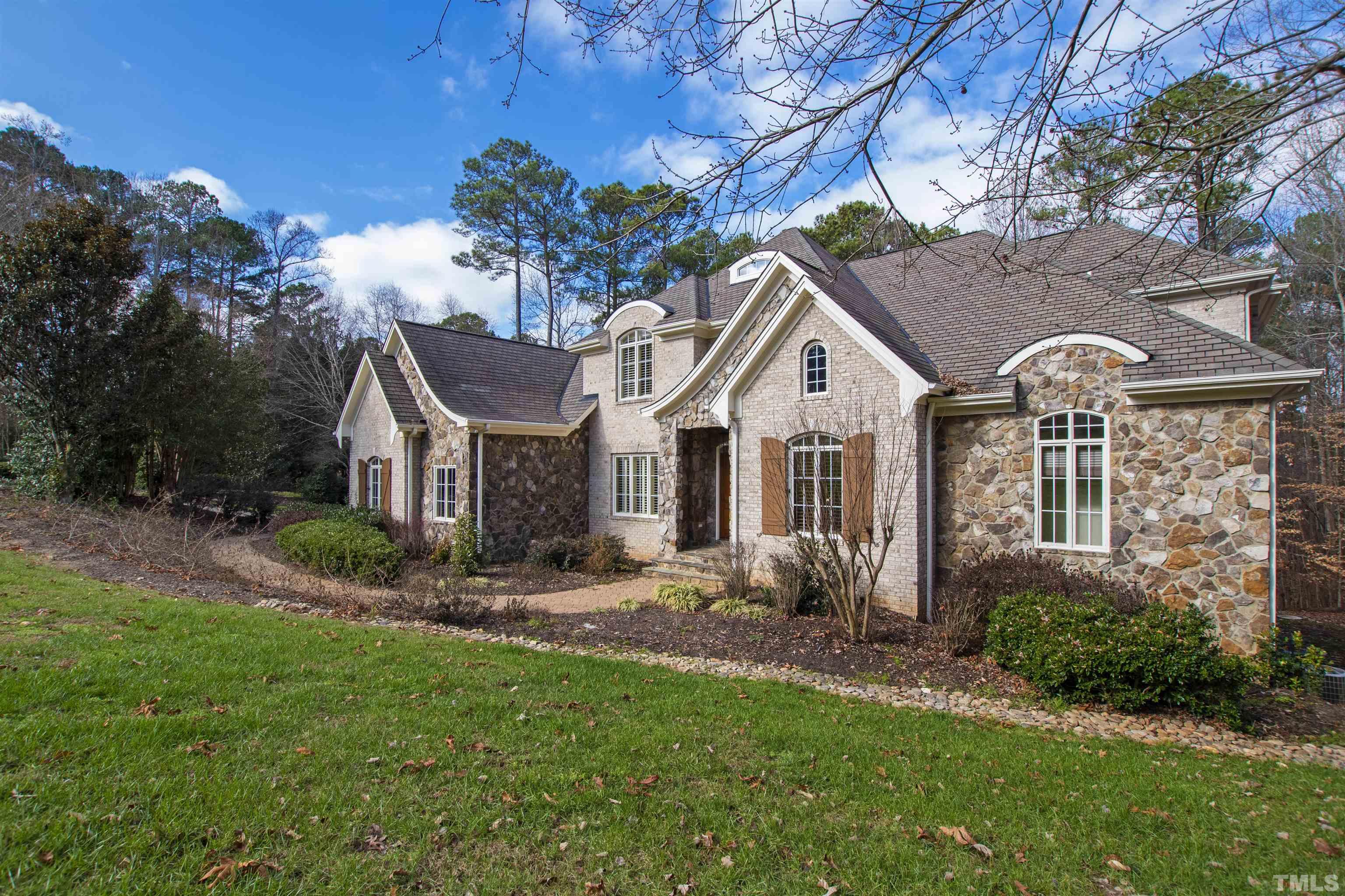 1313 Caistor Lane Raleigh, NC 27614 - Photo 2 of 84 a front view of a house with garden