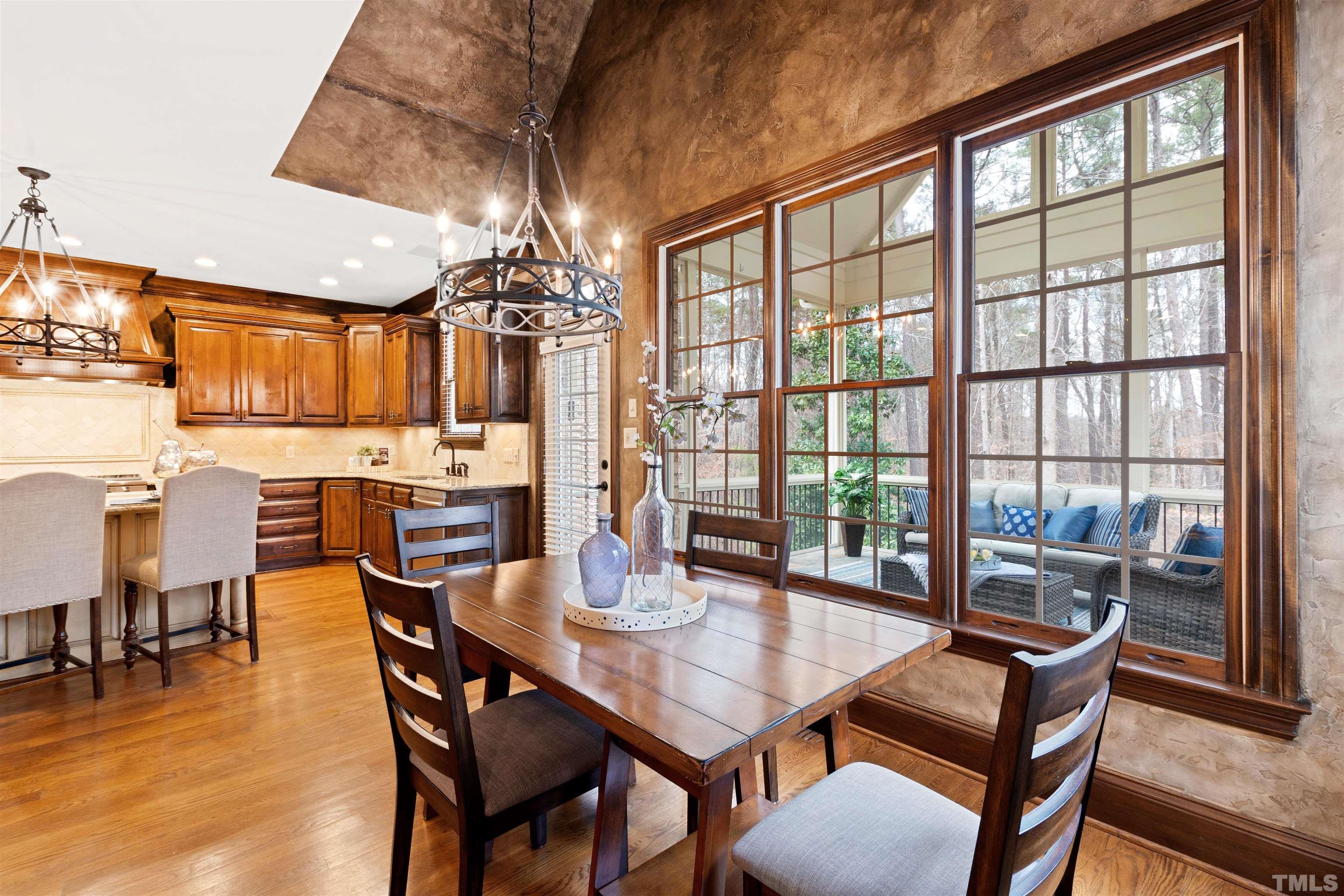 1313 Caistor Lane Raleigh, NC 27614 - Photo 26 of 84 a view of a dining room with furniture window and outside view