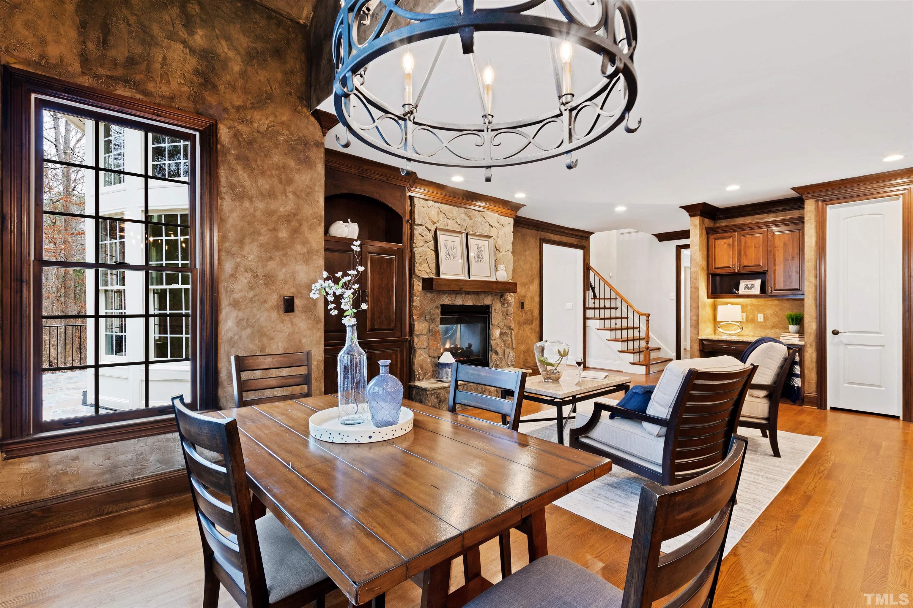 1313 Caistor Lane Raleigh, NC 27614 - Photo 27 of 84 a view of a dining room with furniture window and wooden floor