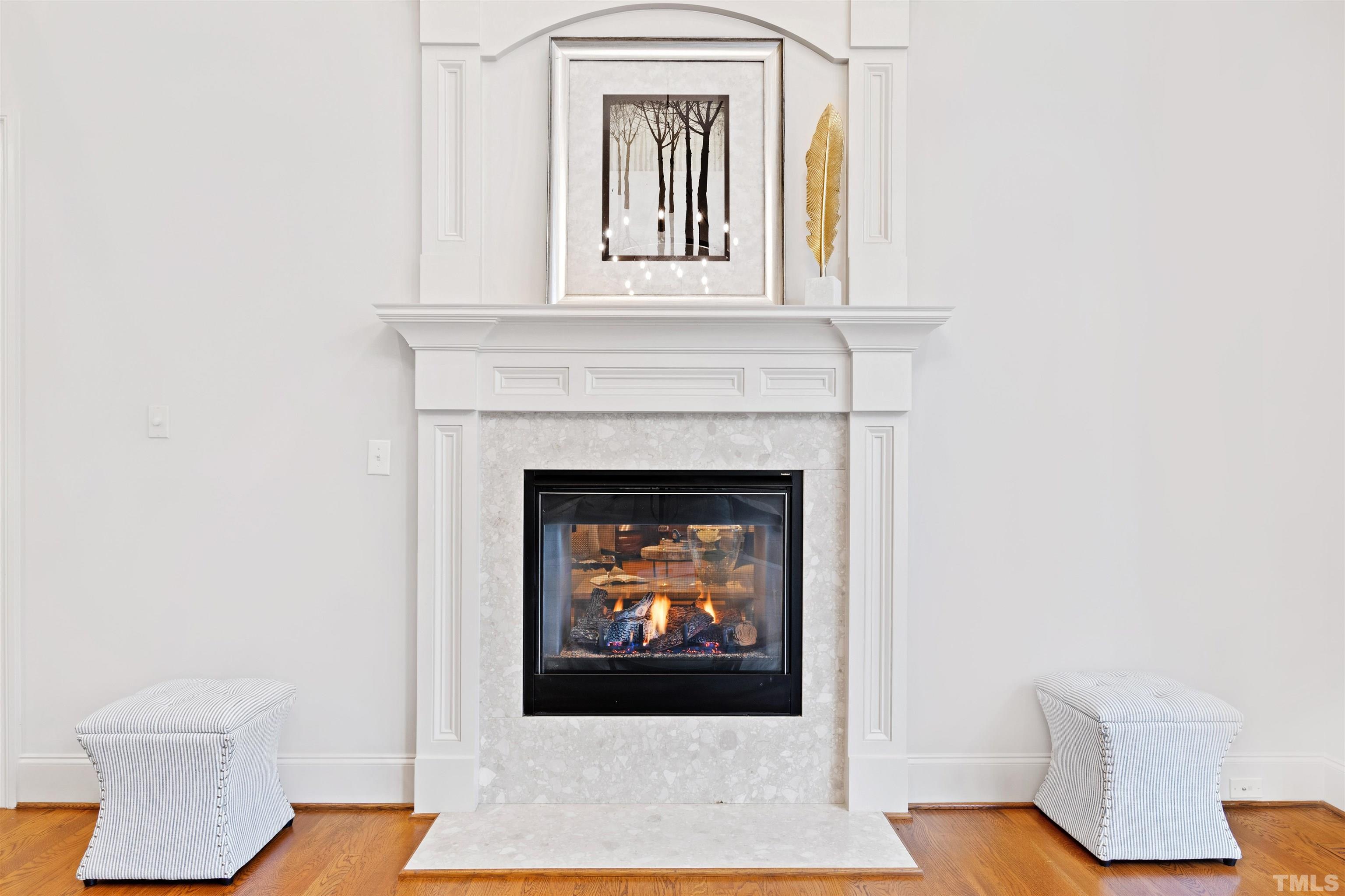 1313 Caistor Lane Raleigh, NC 27614 - Photo 30 of 84 a living room with a fireplace and a fireplace