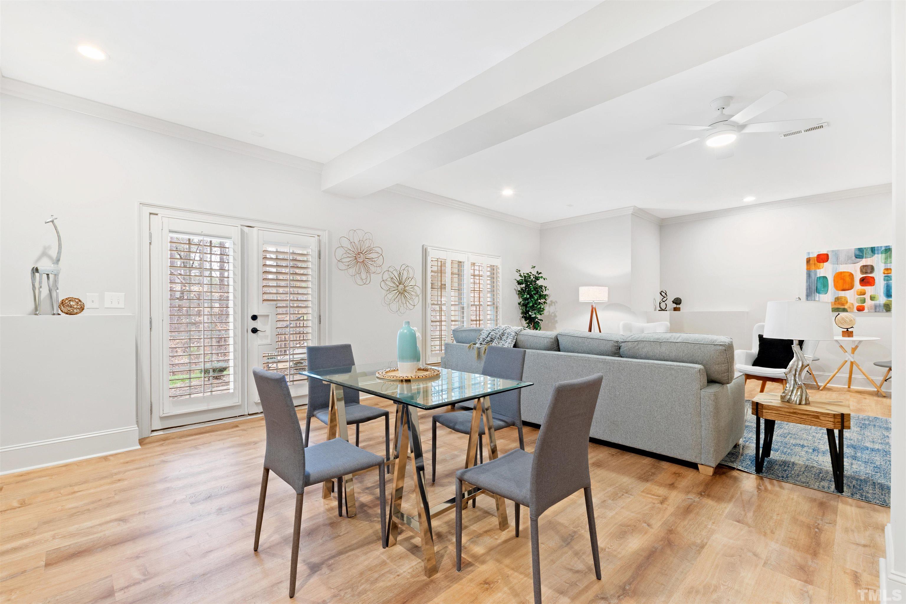 1313 Caistor Lane Raleigh, NC 27614 - Photo 37 of 84 a view of a dining room with furniture and wooden floor