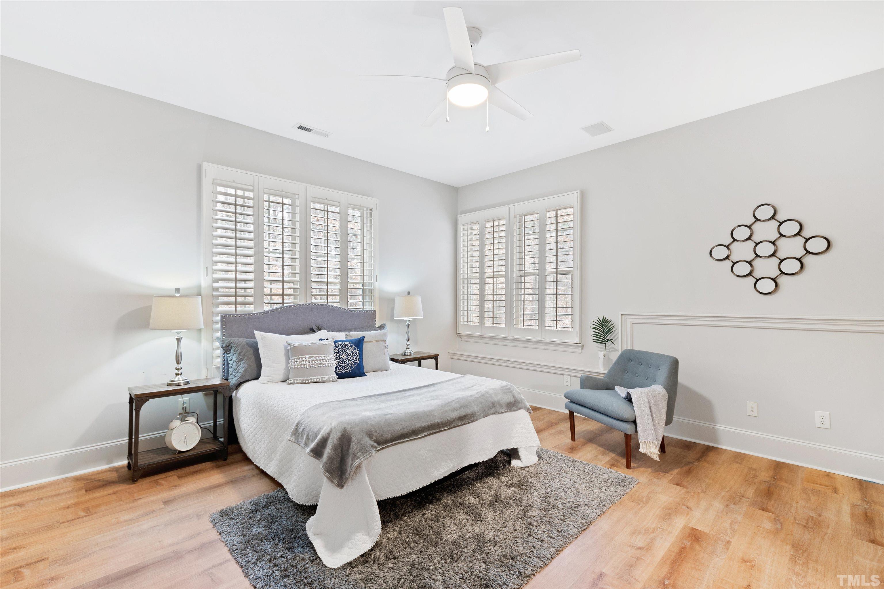 1313 Caistor Lane Raleigh, NC 27614 - Photo 40 of 84 a bed room with a bed and a chair