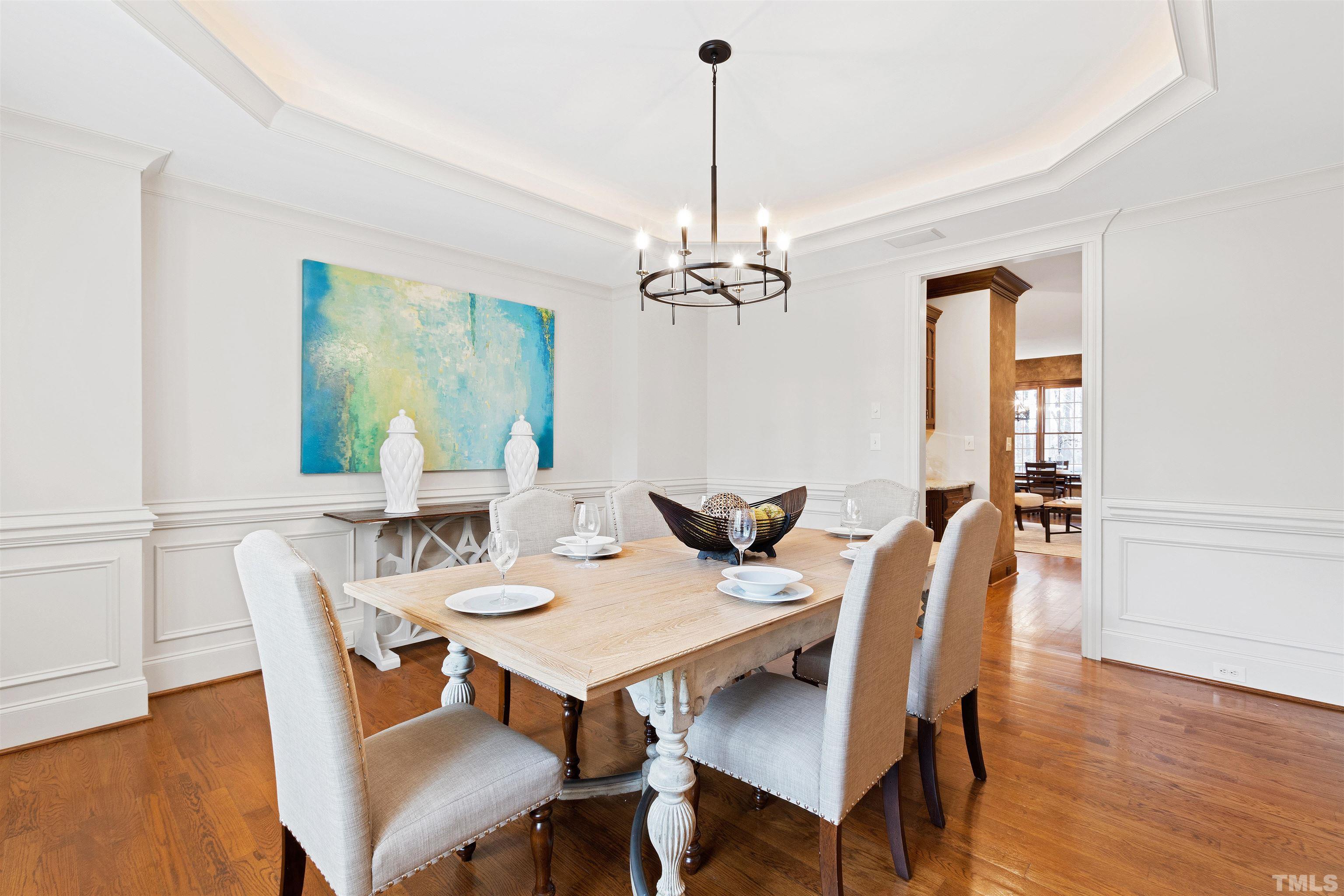 1313 Caistor Lane Raleigh, NC 27614 - Photo 44 of 84 a view of a dining room with furniture window and wooden floor