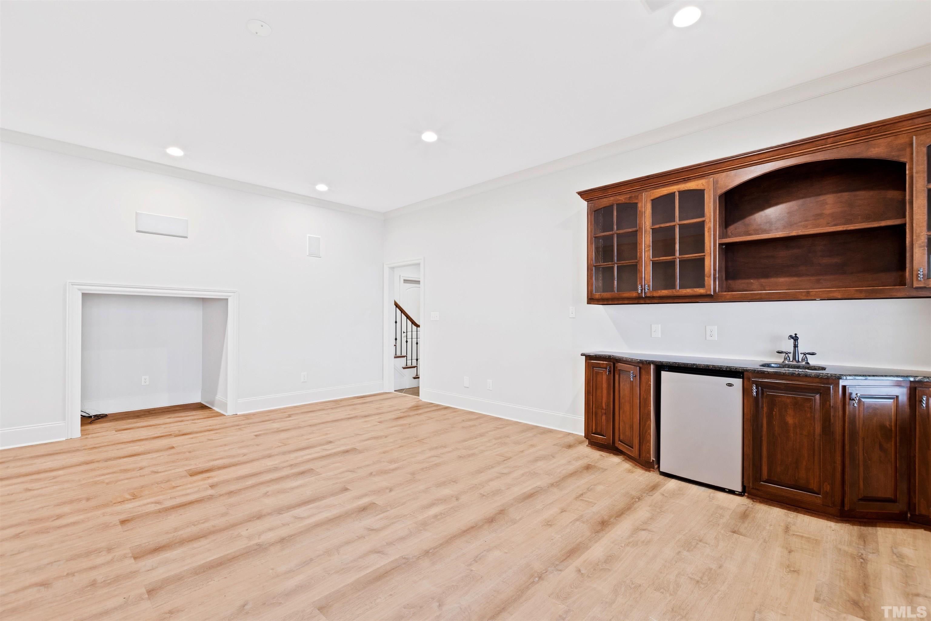 1313 Caistor Lane Raleigh, NC 27614 - Photo 65 of 84 a bedroom with a bed and a television