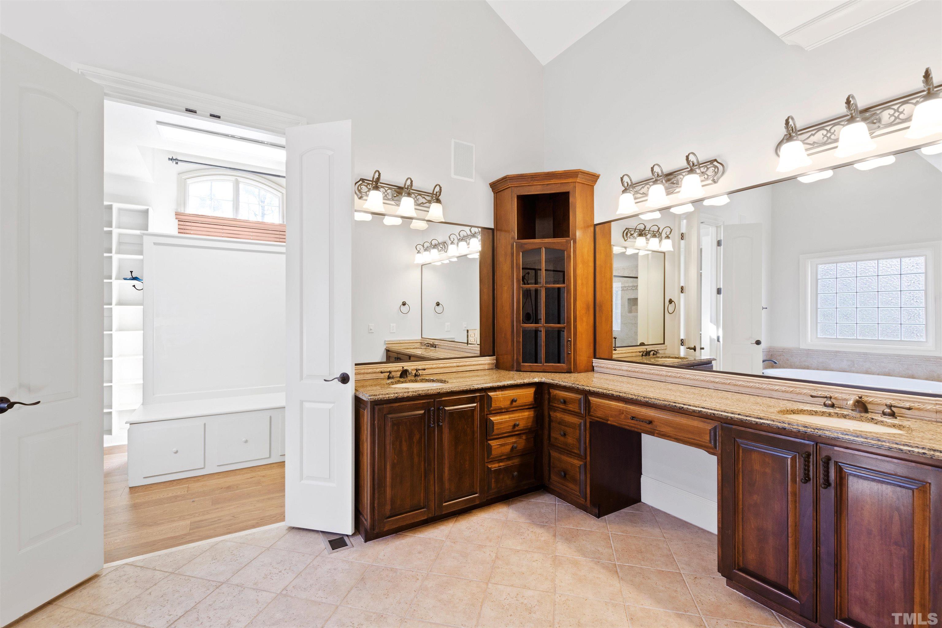 1313 Caistor Lane Raleigh, NC 27614 - Photo 68 of 84 a large kitchen with stainless steel appliances granite countertop a sink and a stove