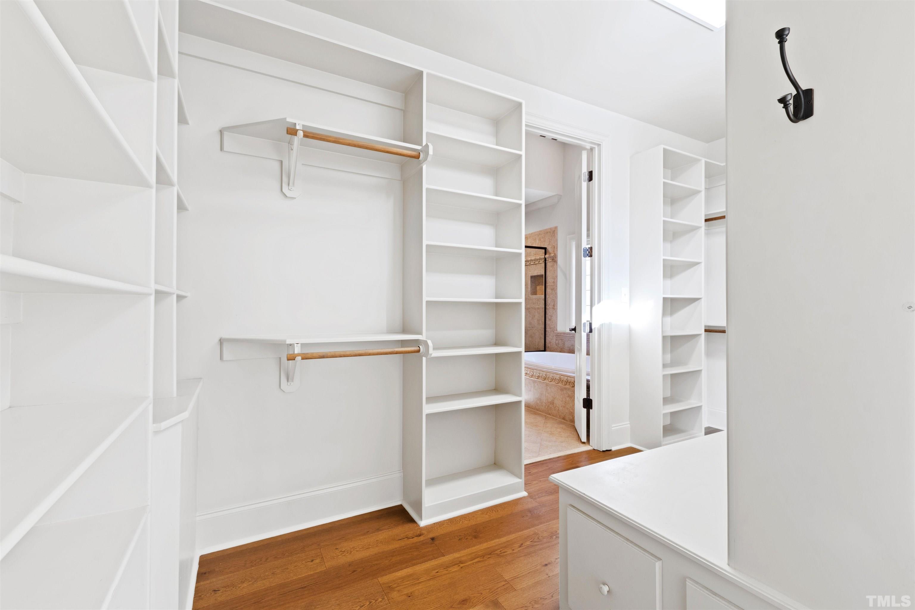 1313 Caistor Lane Raleigh, NC 27614 - Photo 79 of 84 a view of walk in closet with empty racks