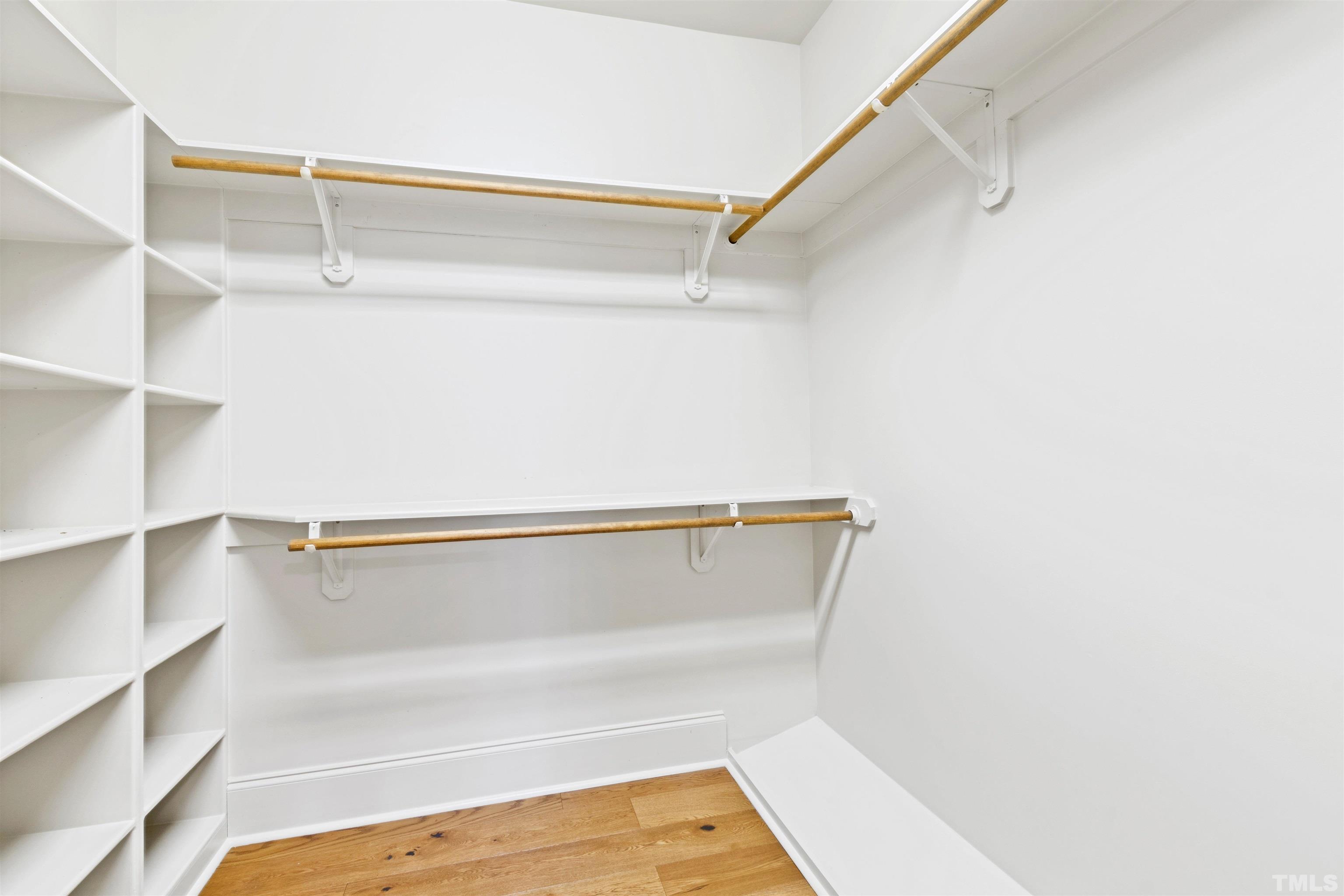 1313 Caistor Lane Raleigh, NC 27614 - Photo 81 of 84 a view of walk in closet with empty racks