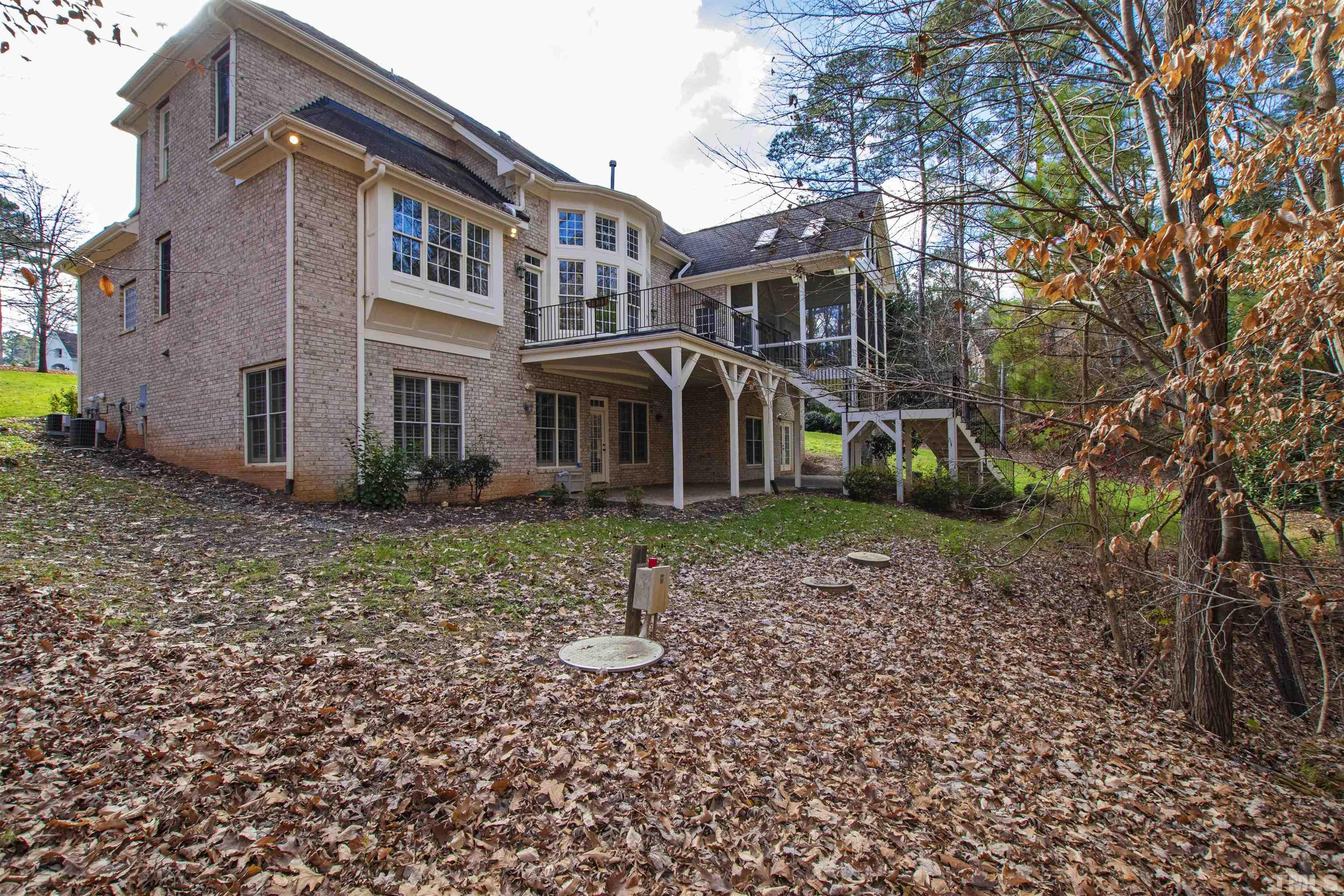 1313 Caistor Lane Raleigh, NC 27614 - Photo 9 of 84 a front view of a house with garden