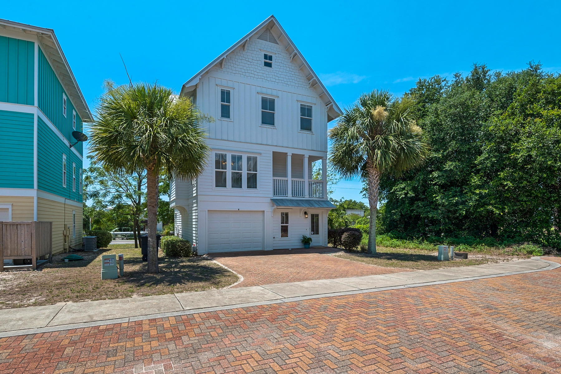 15 Seaspring Cove Santa Rosa Beach, FL 32459 - Photo 2 of 43 a front view of a house with a yard