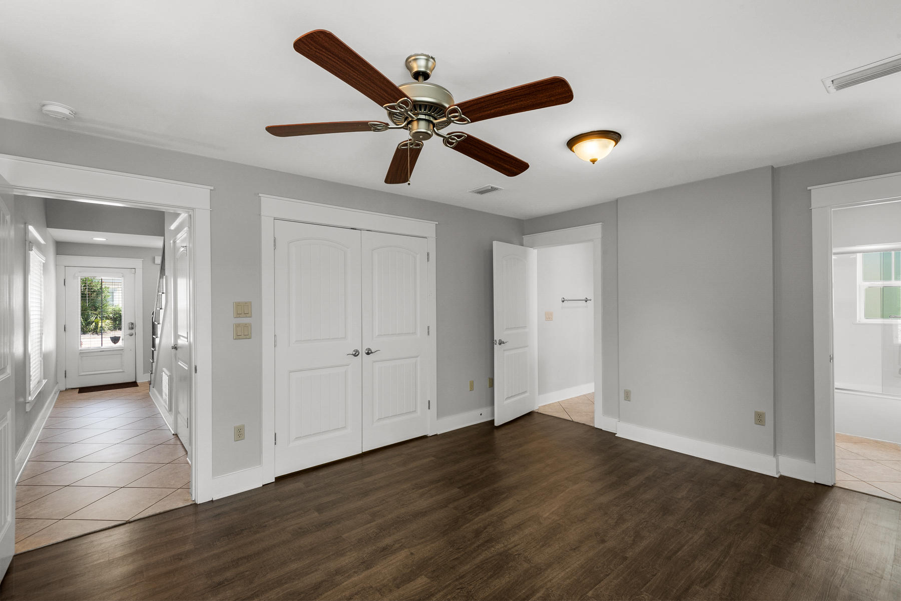 15 Seaspring Cove Santa Rosa Beach, FL 32459 - Photo 12 of 43 a view of an empty room with wooden floor