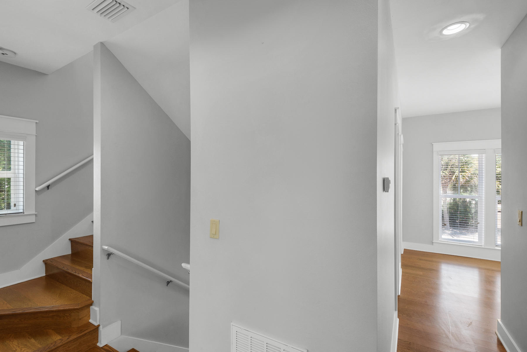 15 Seaspring Cove Santa Rosa Beach, FL 32459 - Photo 16 of 43 a view of a hallway with wooden floor and closet