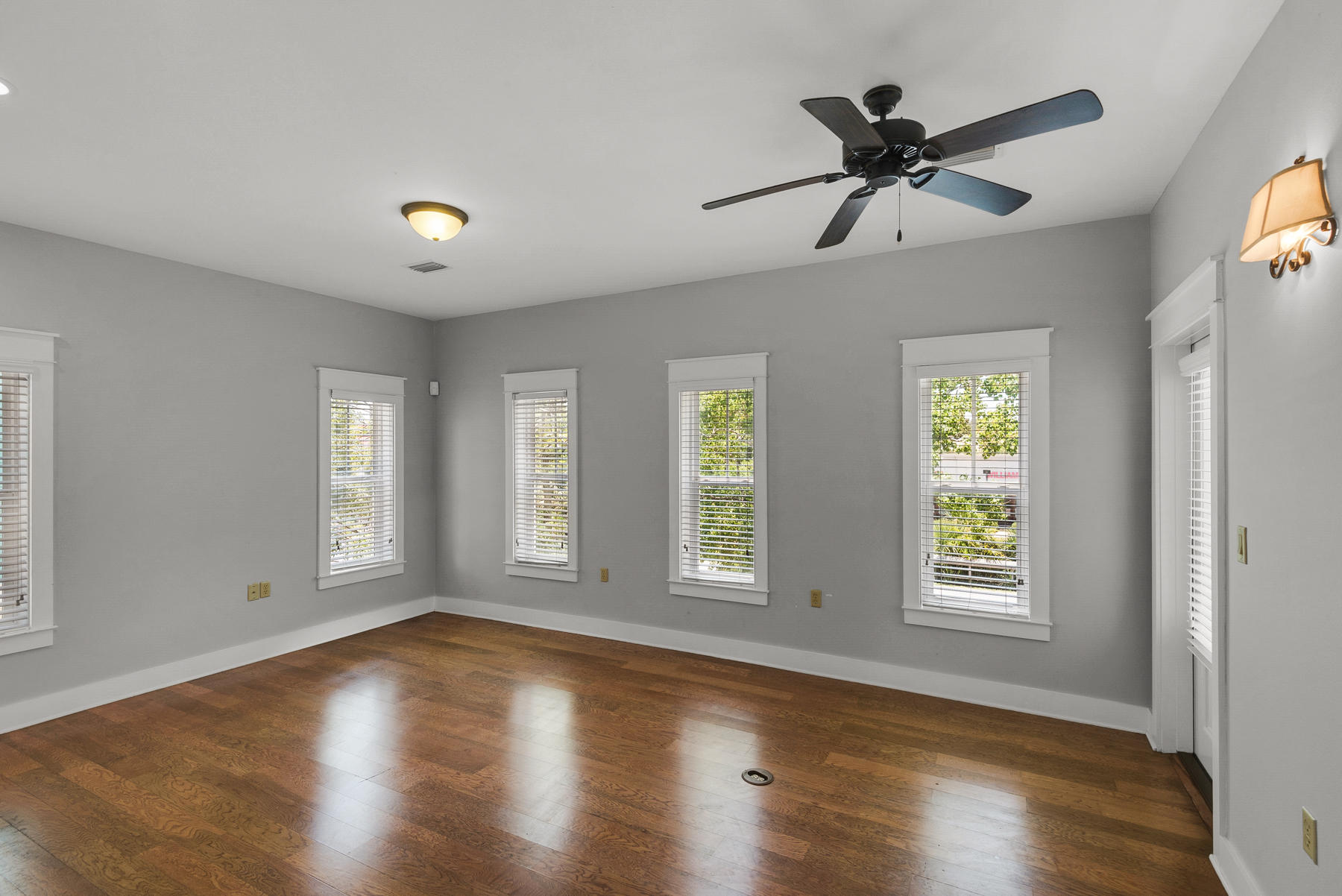 15 Seaspring Cove Santa Rosa Beach, FL 32459 - Photo 17 of 43 a view of an empty room with wooden floor and window