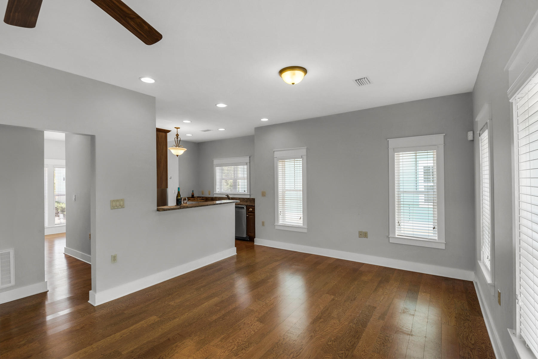 15 Seaspring Cove Santa Rosa Beach, FL 32459 - Photo 19 of 43 a view of an empty room with wooden floor and a window