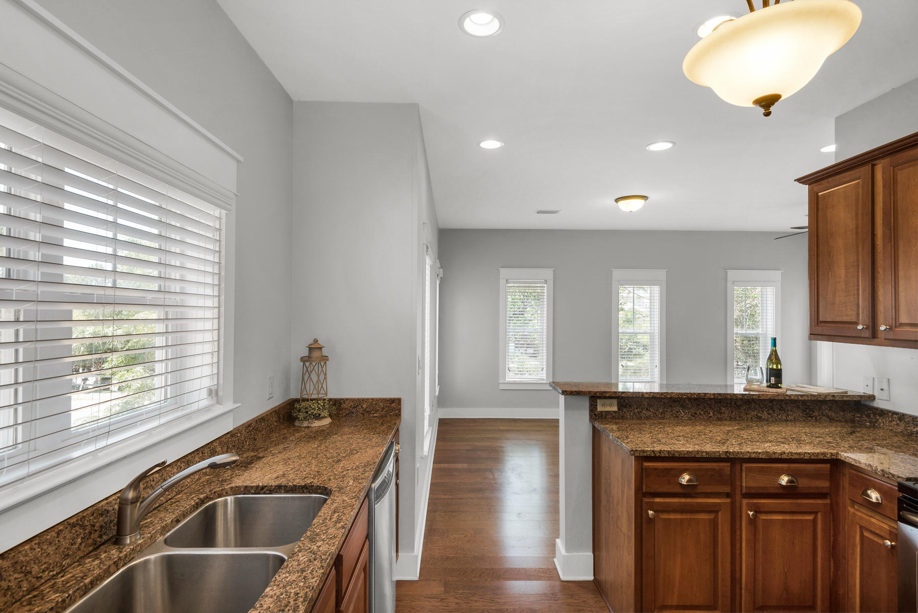 15 Seaspring Cove Santa Rosa Beach, FL 32459 - Photo 24 of 43 a kitchen with granite countertop a sink and a stove