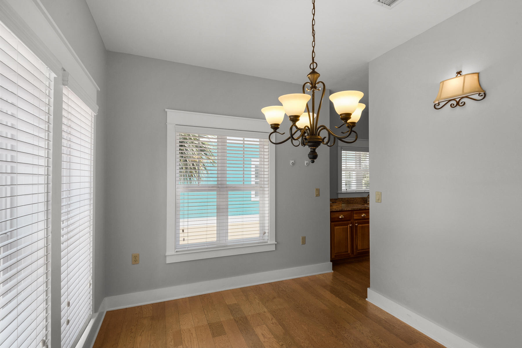 15 Seaspring Cove Santa Rosa Beach, FL 32459 - Photo 27 of 43 a bedroom with a bed and a chandelier