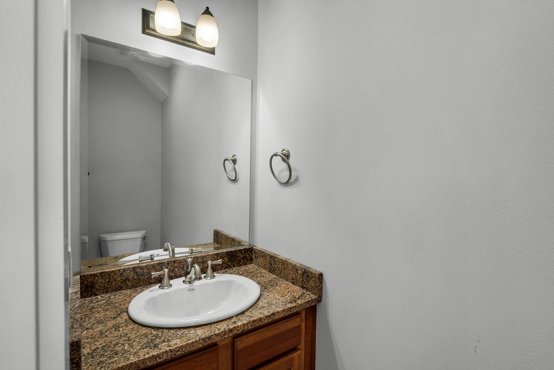 15 Seaspring Cove Santa Rosa Beach, FL 32459 - Photo 29 of 43 a bathroom with a sink and a mirror
