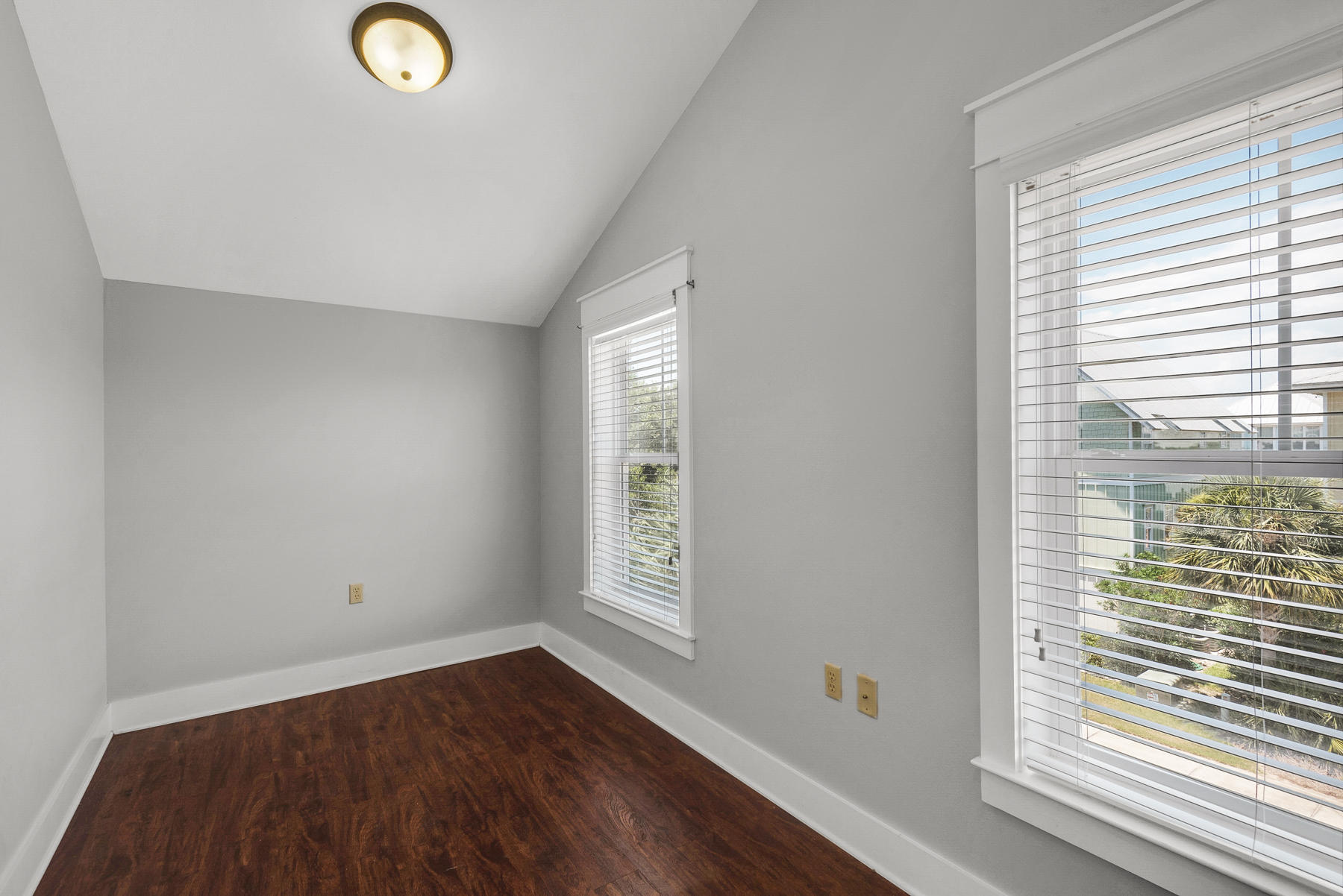 15 Seaspring Cove Santa Rosa Beach, FL 32459 - Photo 31 of 43 an empty room with wooden floor and windows