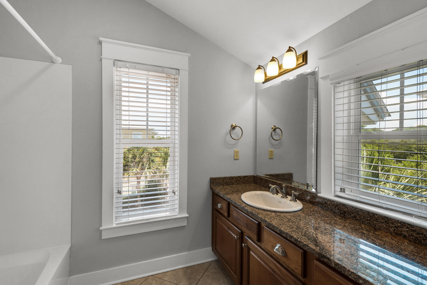 15 Seaspring Cove Santa Rosa Beach, FL 32459 - Photo 41 of 43 a bathroom with a granite countertop sink and a window