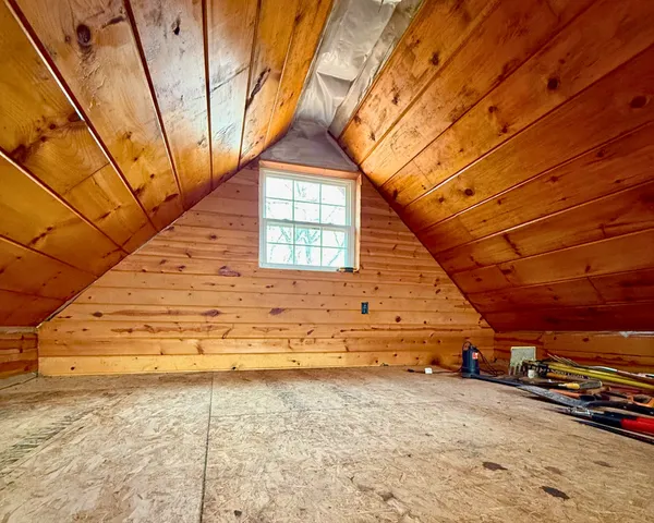 a view of a backyard of the house