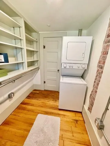 a bathroom with a tub sink and toilet