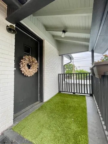 a view of a porch with garden