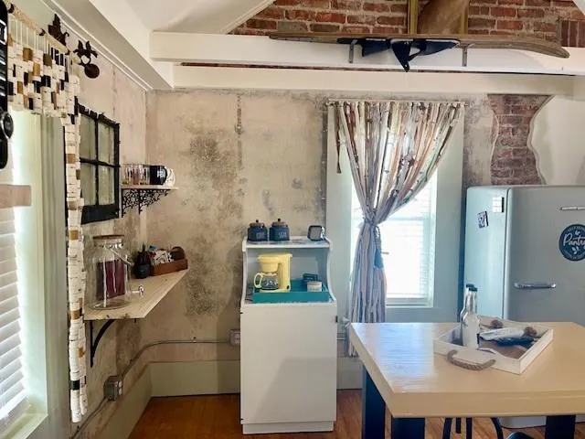 a view of a dining room with furniture
