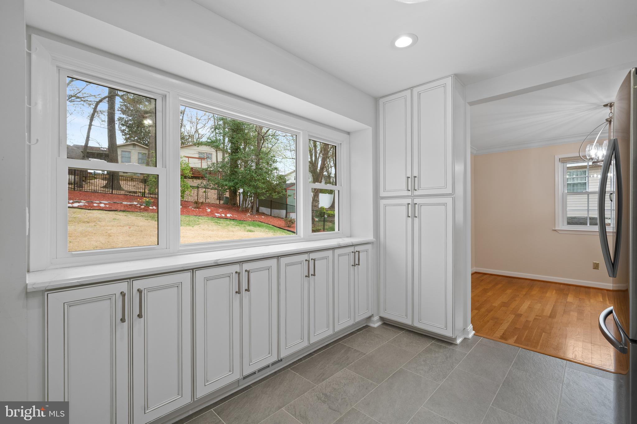 6119 Greeley Boulevard Springfield, VA 22152 - Photo 12 of 38 an empty room with windows