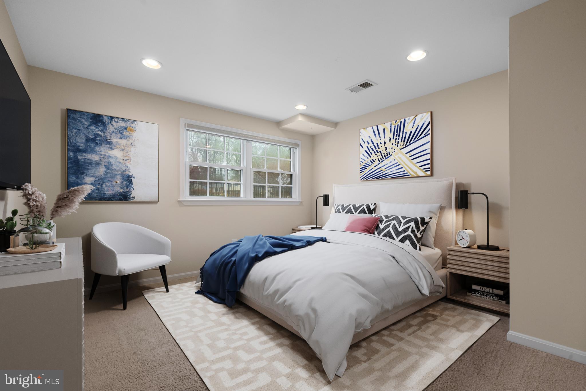 6119 Greeley Boulevard Springfield, VA 22152 - Photo 23 of 38 a bedroom with a bed and a couch