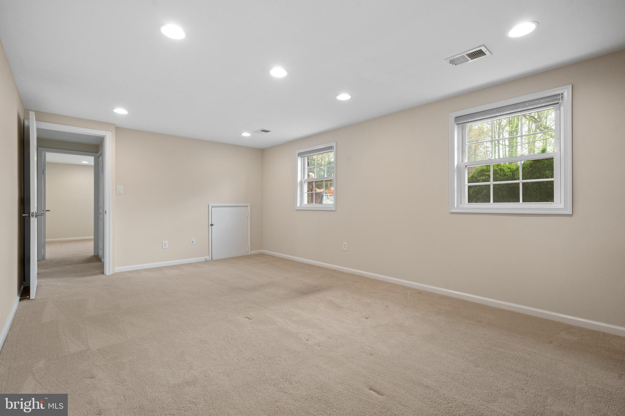 6119 Greeley Boulevard Springfield, VA 22152 - Photo 27 of 38 an empty room with windows and closet