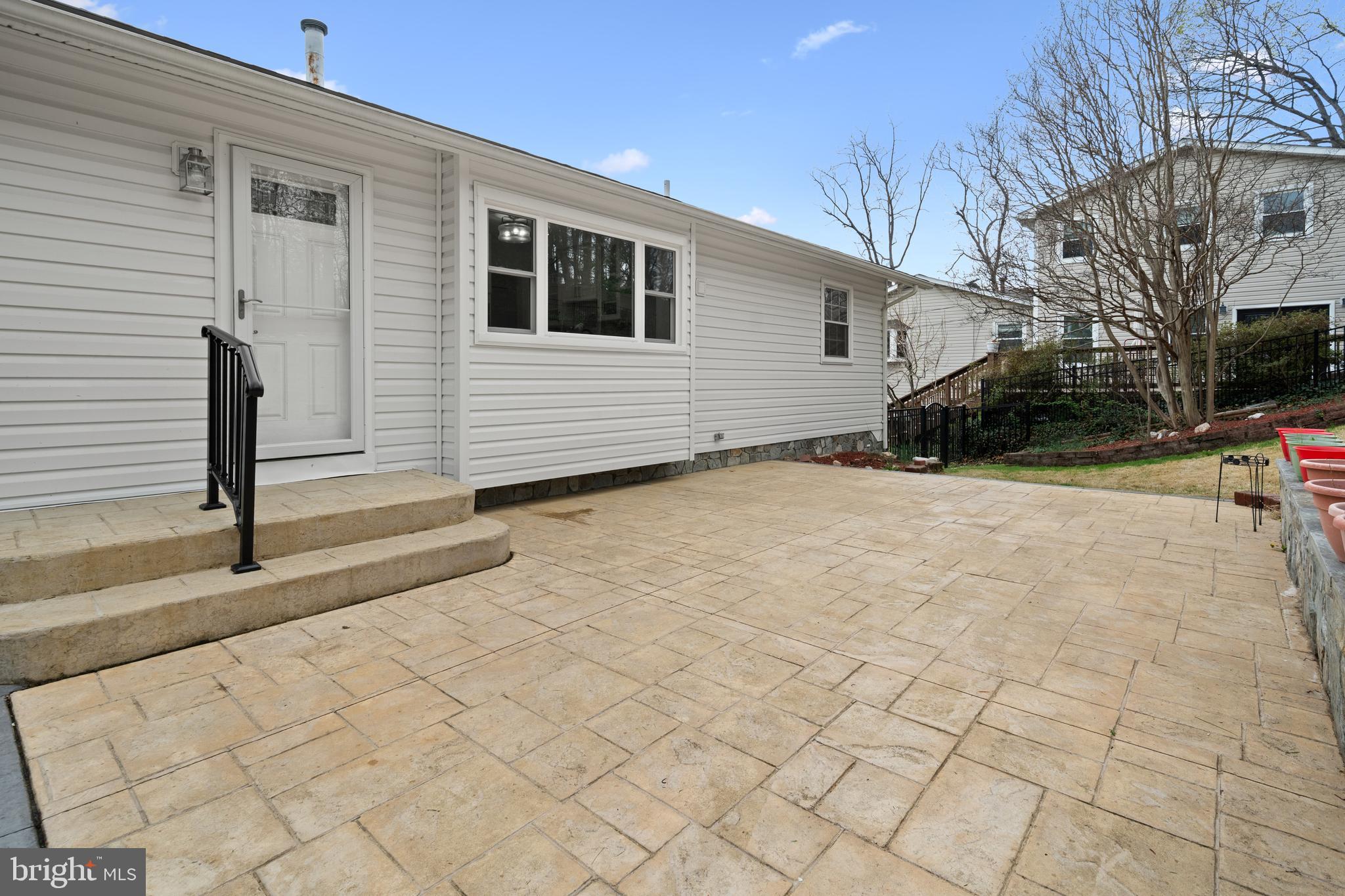 6119 Greeley Boulevard Springfield, VA 22152 - Photo 34 of 38 a view of a backyard of the house