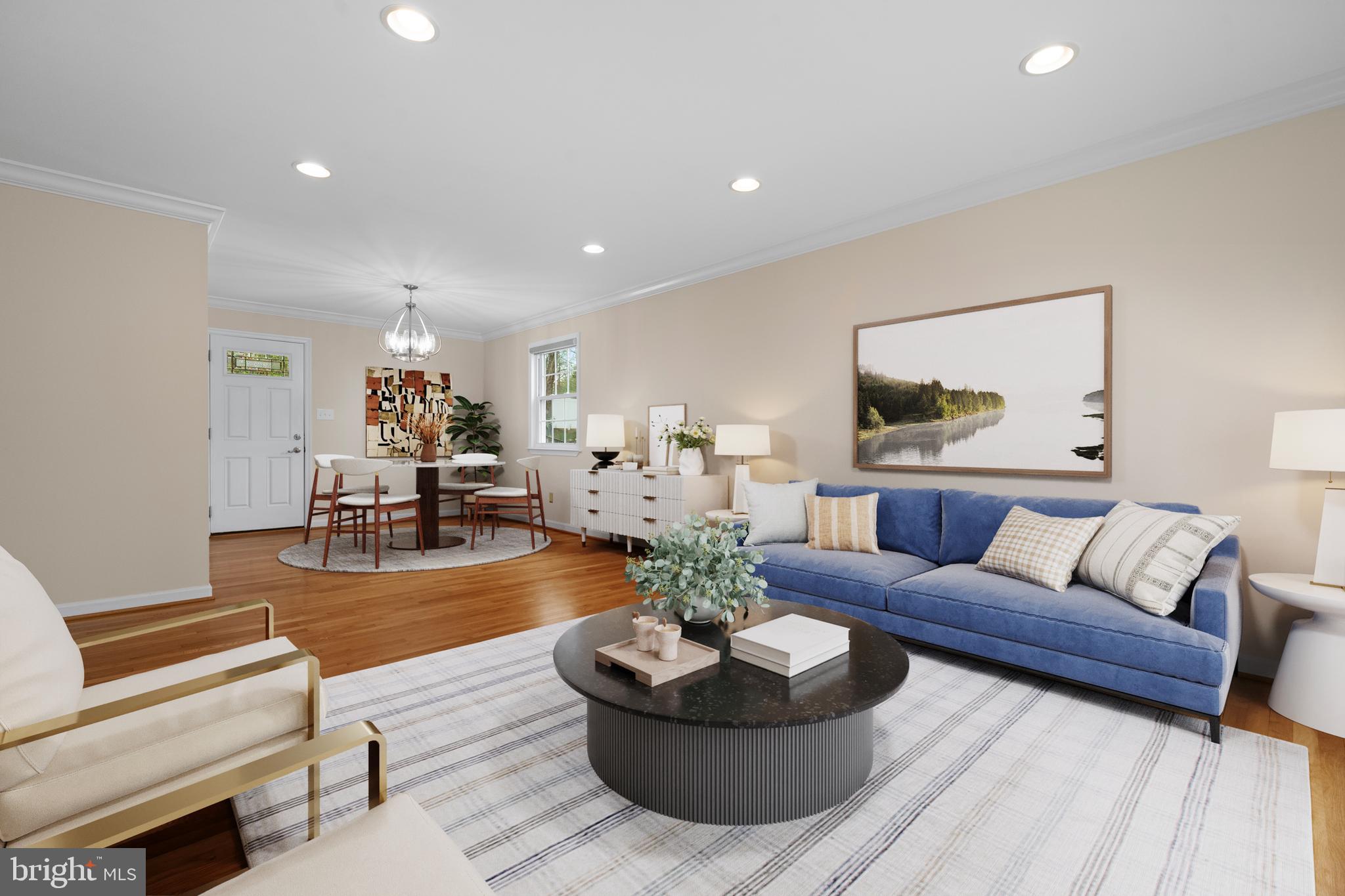 6119 Greeley Boulevard Springfield, VA 22152 - Photo 6 of 38 a living room with furniture and a painting