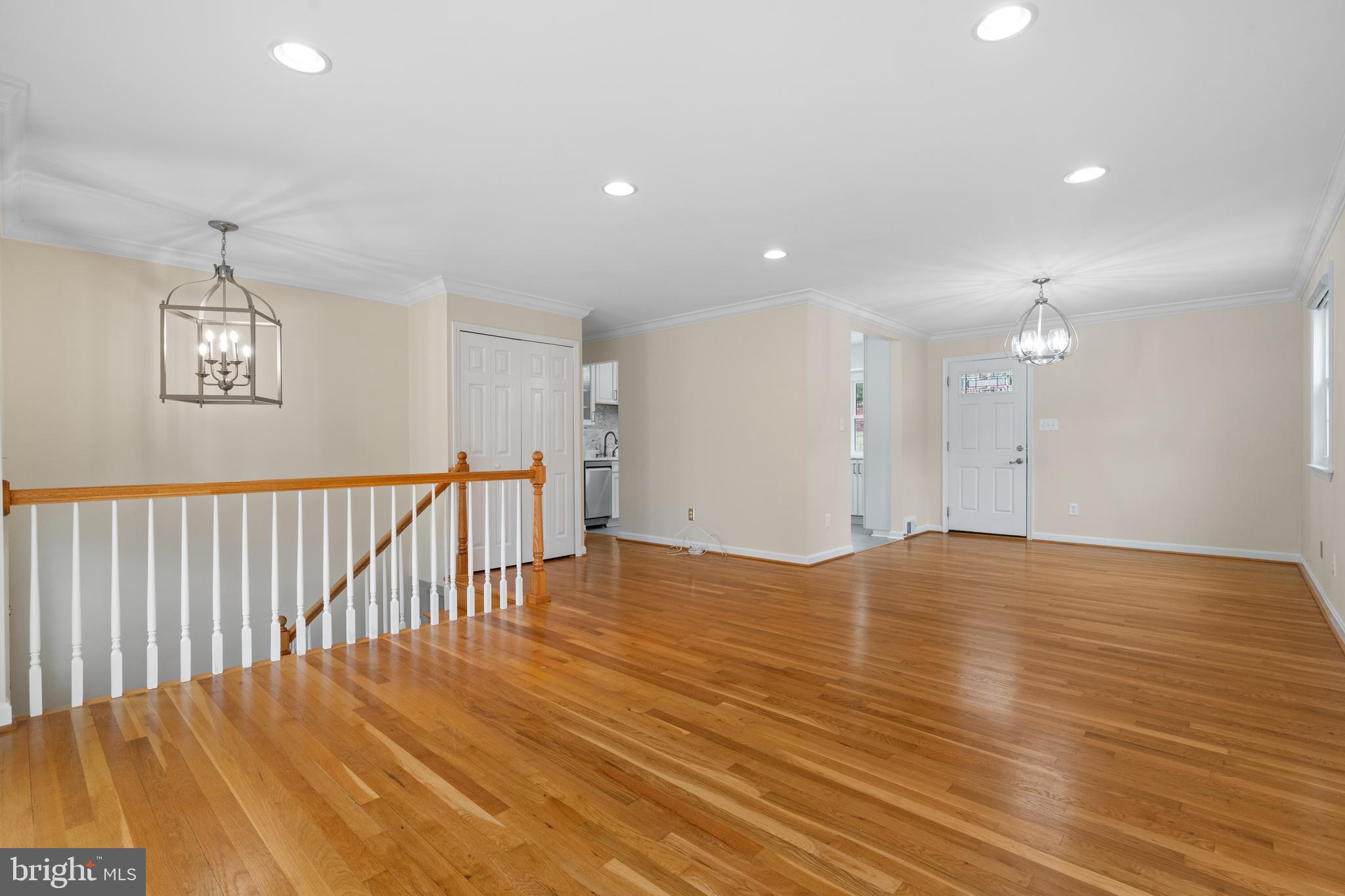 6119 Greeley Boulevard Springfield, VA 22152 - Photo 7 of 38 a view of an empty room with wooden floor