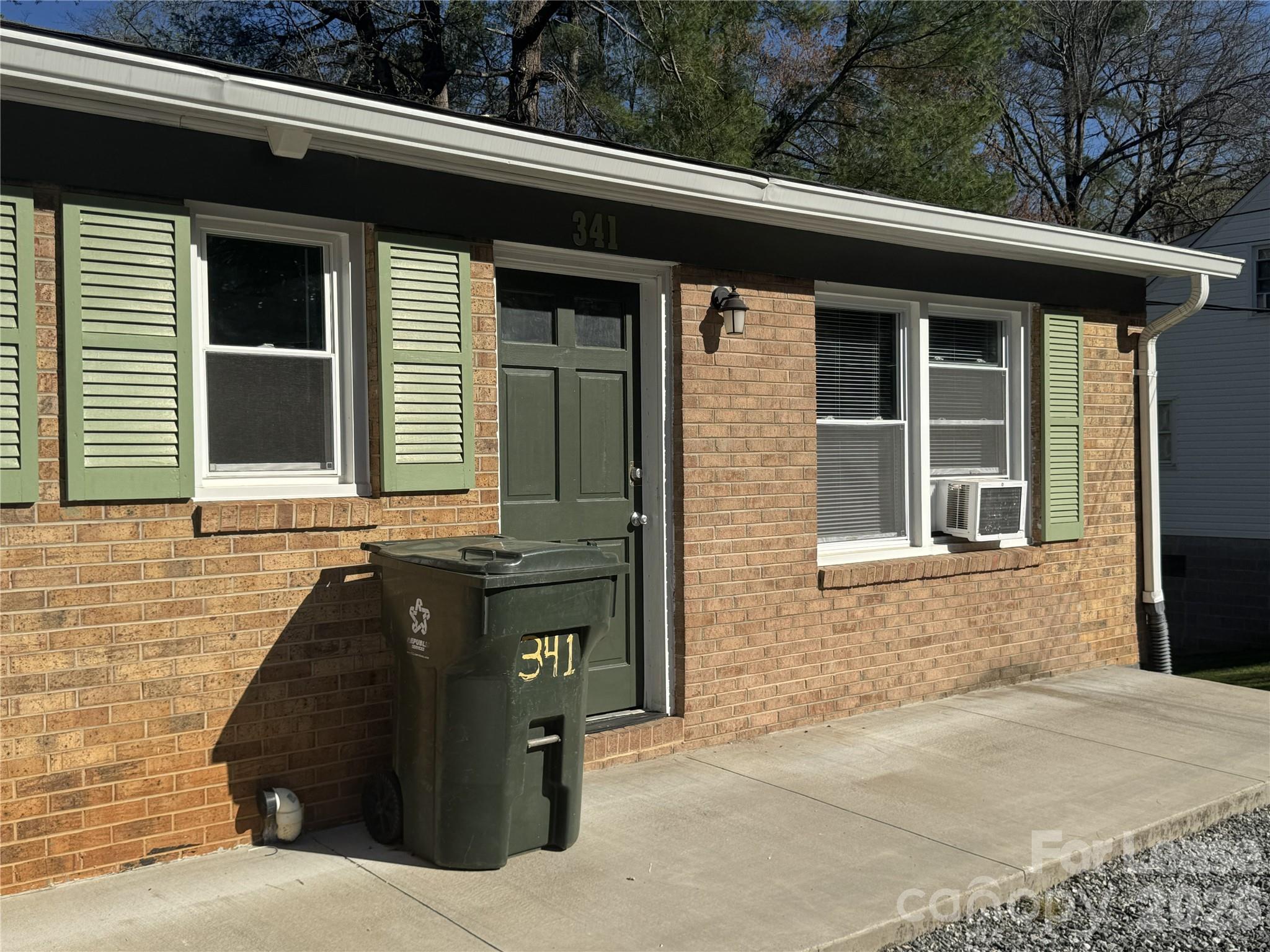 341 Laurel Street Hudson, NC 28638 - Photo 1 of 8 a front view of a house with outdoor space