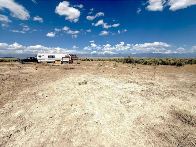 a view of swimming pool with outdoor seating