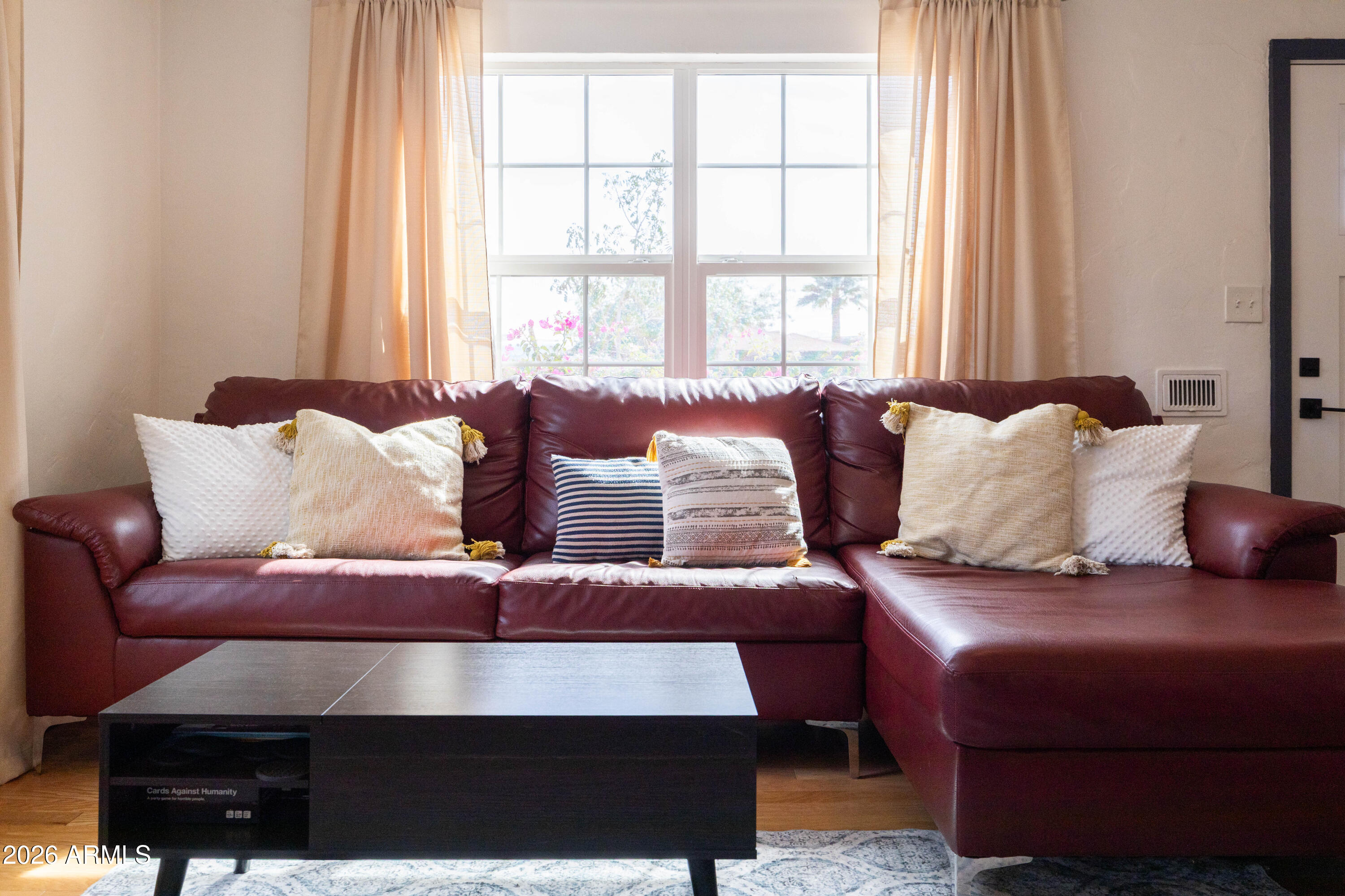 1222 East Almeria Road Phoenix, AZ 85006 - Photo 12 of 55 a living room with furniture and a large window