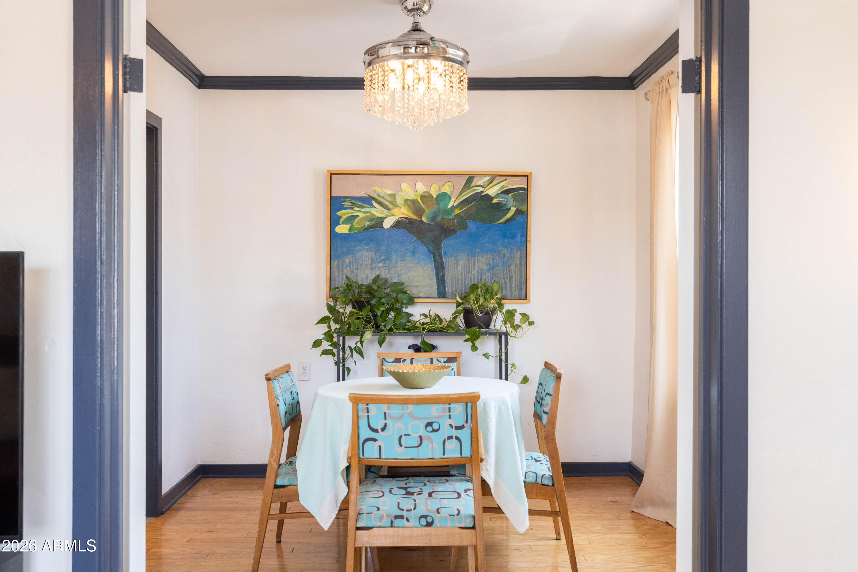 1222 East Almeria Road Phoenix, AZ 85006 - Photo 15 of 55 a view of a dining room with a table and chairs