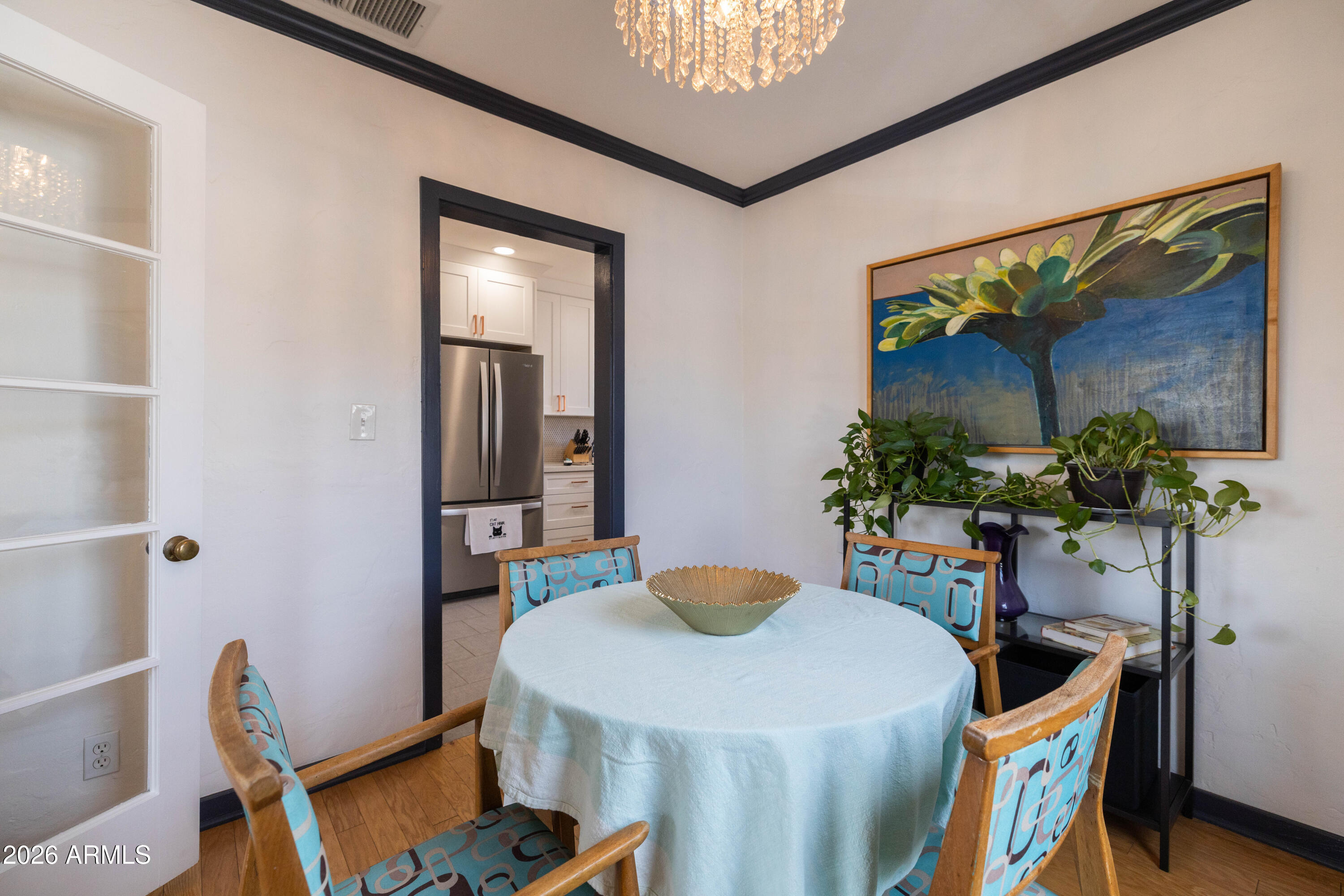 1222 East Almeria Road Phoenix, AZ 85006 - Photo 16 of 55 a dining room with furniture and wooden floor
