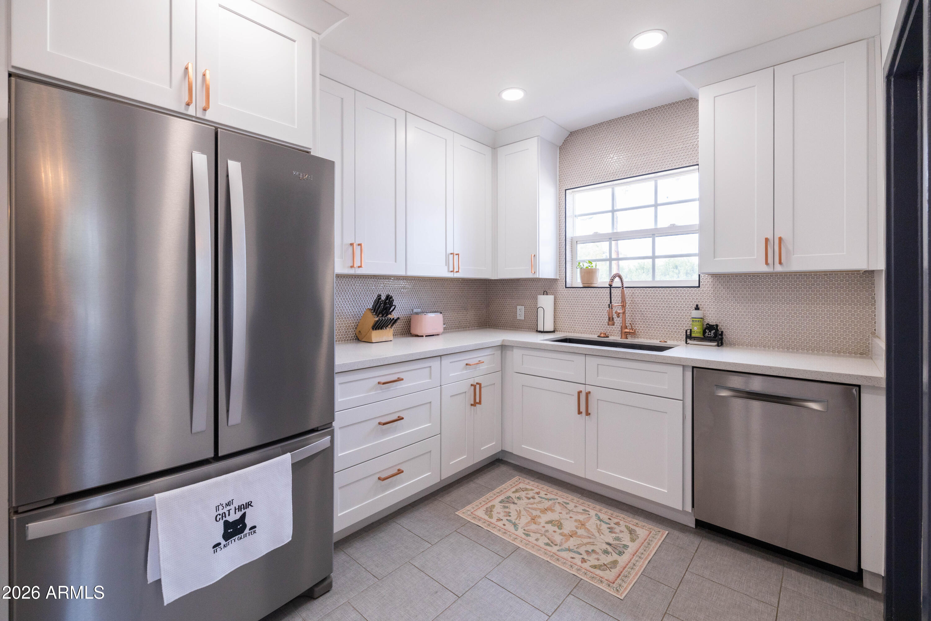 1222 East Almeria Road Phoenix, AZ 85006 - Photo 20 of 55 a kitchen with stainless steel appliances granite countertop a refrigerator sink and cabinets